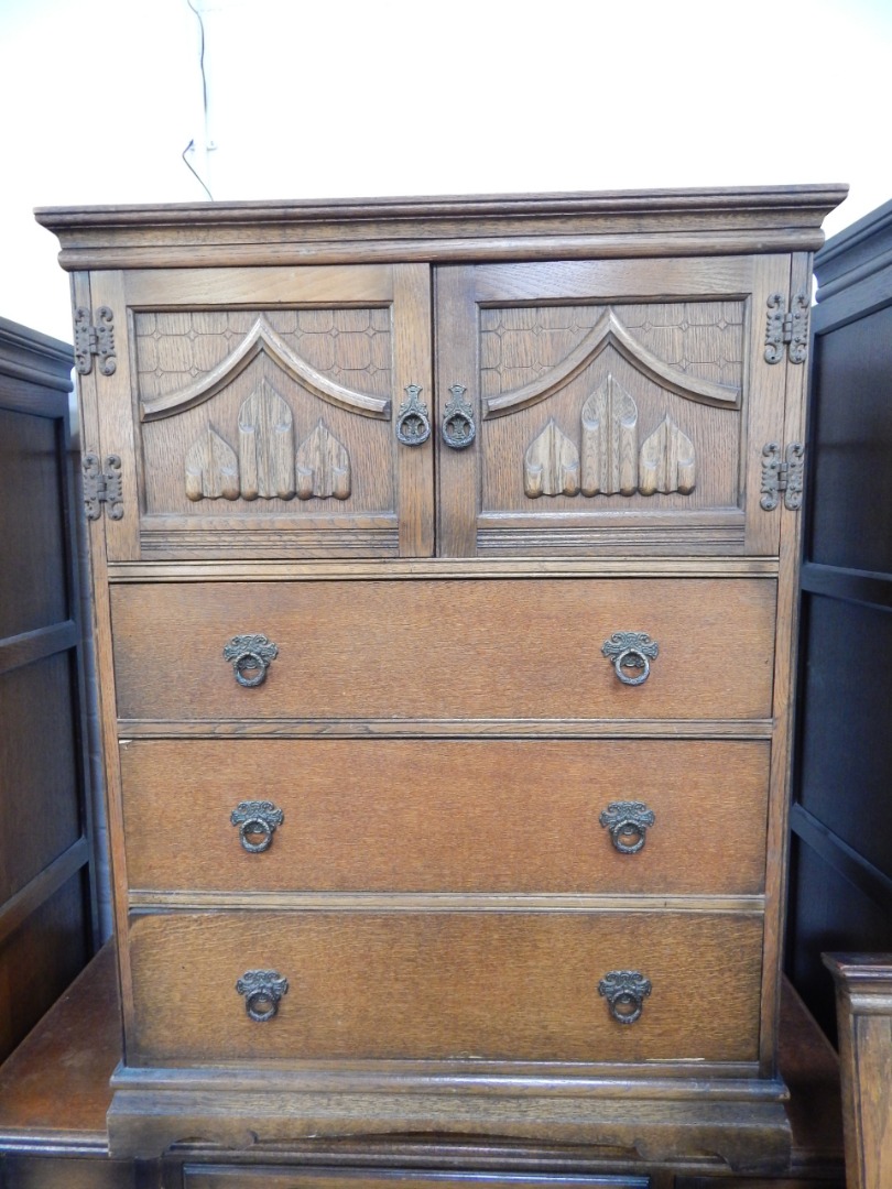 Appraisal: An Old Charm oak linen press with a pair of