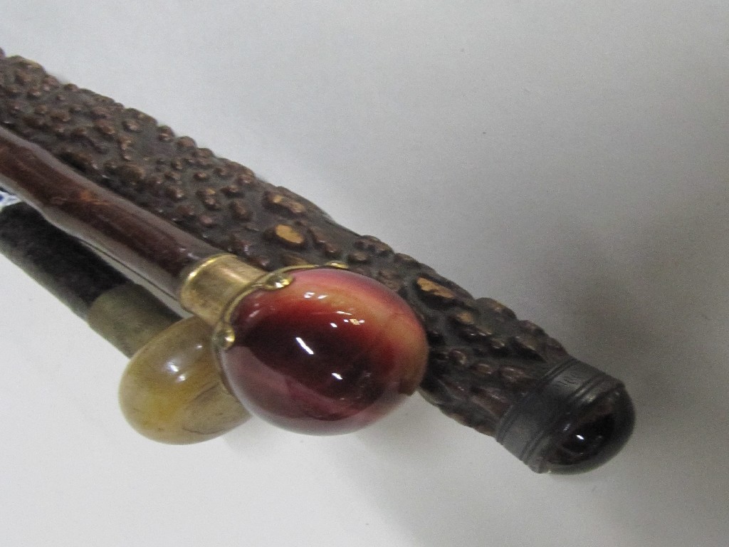 Appraisal: Lot comprising three Agate topped walking sticks