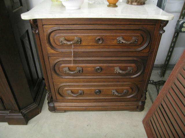 Appraisal: Victorian Marble Top Washstand fine carved twig handles triple drawer