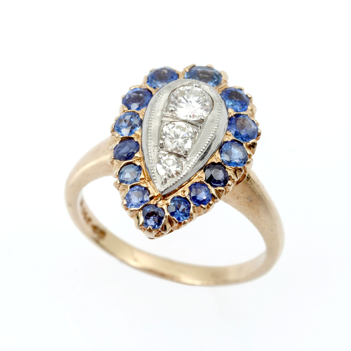 Appraisal: K MID CENTURY SAPPHIRE DIAMOND RING round brilliant cut and