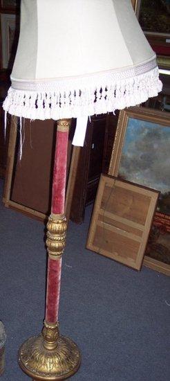 Appraisal: An Italian altar candlestick type standard lamp with fringed shade