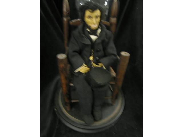 Appraisal: Folk Art Style Figurine of Lincoln wax under Victorian glass