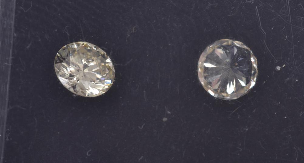 Appraisal: TWO ROUND BRILLIANT CUT DIAMONDS WEIGHING CTS AND CTS TWO