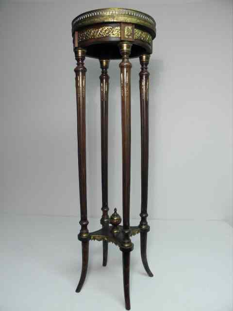 Appraisal: A Federal style mahogany fern stand Pierced gilt bronze rim