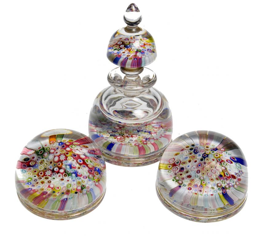 Appraisal: TWO SIMILAR STOURBRIDGE CONCENTRIC MILLEFIORE PAPERWEIGHTS AND AN INKWELL PAPERWEIGHT