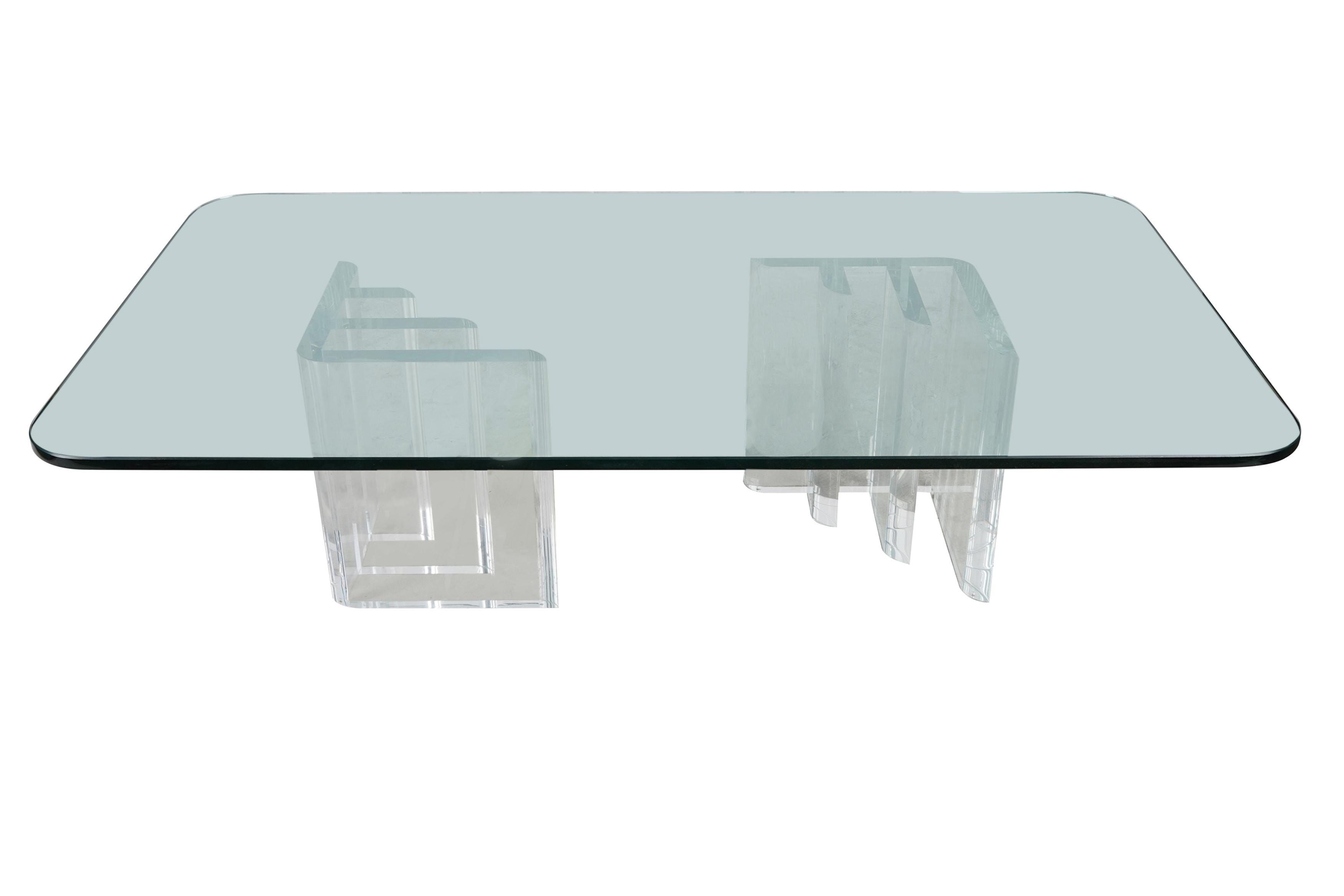 Appraisal: LUCITE GLASS COFFEE TABLE the rectangular top with rounded corners