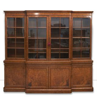 Appraisal: Edwardian burl walnut breakfront bookcase Edwardian burl walnut breakfront bookcase