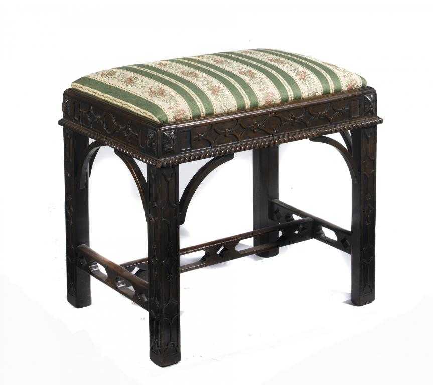 Appraisal: A MAHOGANY DRESSING STOOL with blind fret carved and gadrooned