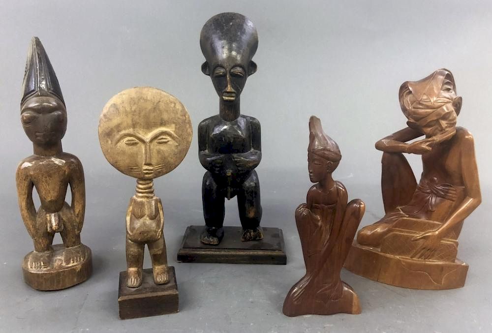 Appraisal: Five African Wood Carved Figures Five African wood carved figures