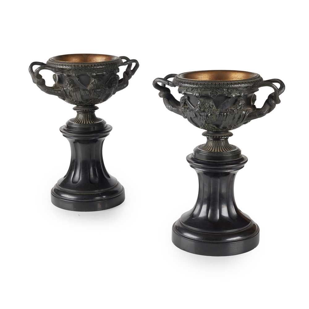 Appraisal: A PAIR OF BRONZE WARWICK VASES TH CENTURY Dark brown