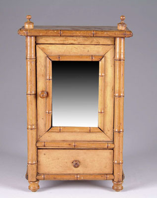 Appraisal: MINIATURE MIRROR FRONT WARDROBE Bamboo edged cabinet with turned finials