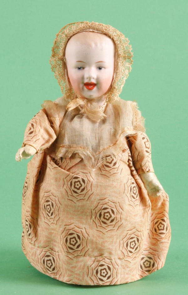 Appraisal: Smiling Gebruder Heubach mechanical doll with blue integlio eyes Mark