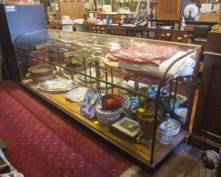 Appraisal: Honduras Mahogany Curved Glass Counter Showcase from Edinburgh Scotland Silver