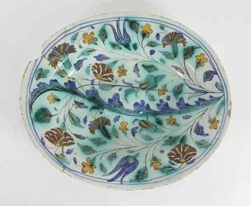 Appraisal: An oval Iznik style dish possibly Paduan Candiana type th