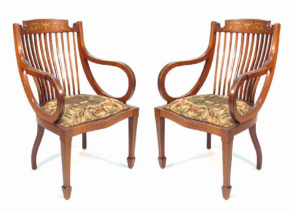 Appraisal: A pair of Edwardian mahogany inlaid armchairs height in width