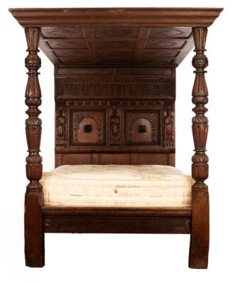 Appraisal: A four-poster bed of th Century style the backboard carved