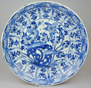 Appraisal: A Chinese blue and white dish decorated with peony flowers