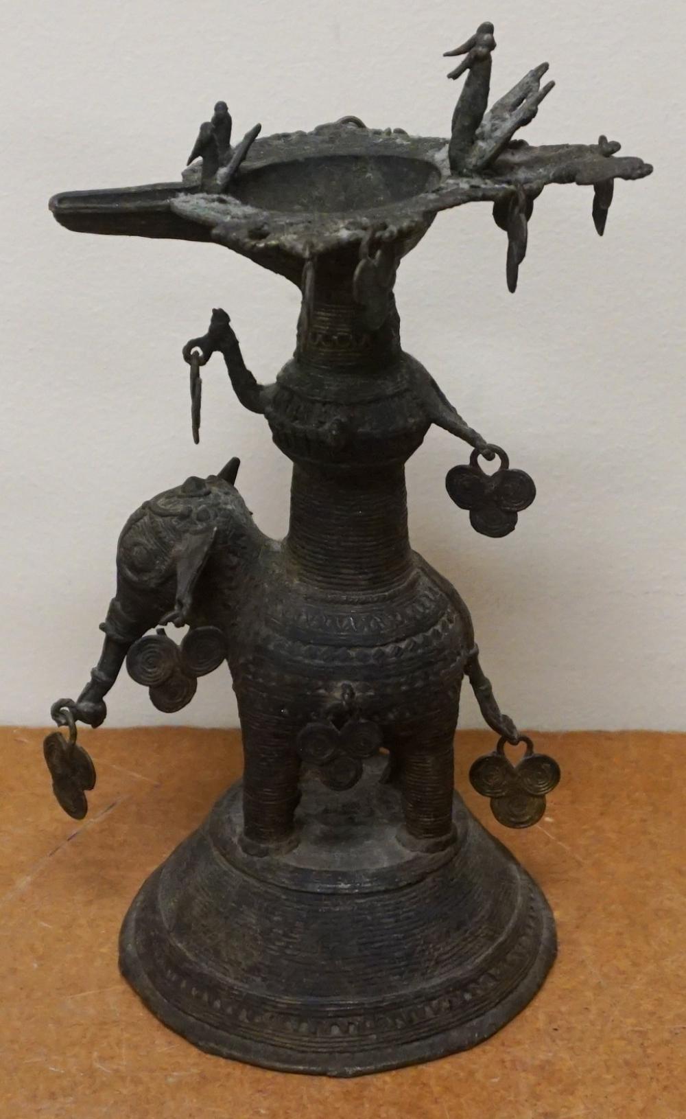 Appraisal: Southeast Asian Patinated Metal Figural Oil Lamp H in cm