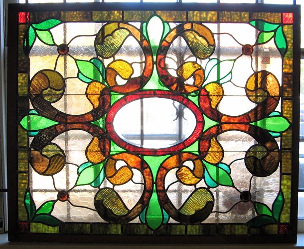 Appraisal: A CUSTOM HAND MADE STAINED AND LEADED GLASS WINDOW PANEL