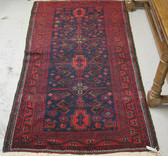 Appraisal: AFGHAN BELOUCHI TRIBAL AREA RUG hand knotted in an overall