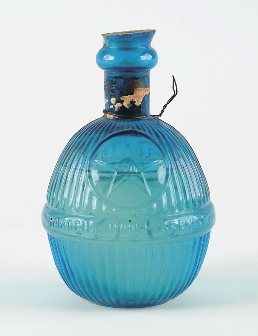 Appraisal: HARDEN S STAR HAND GRENADE Sapphire blue with contents SIZE