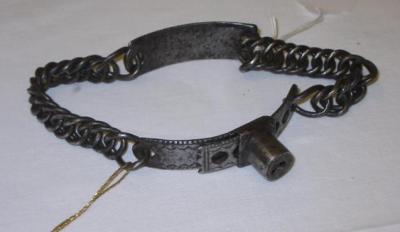 Appraisal: A STEEL DOG COLLAR of chain form with brass inlaid