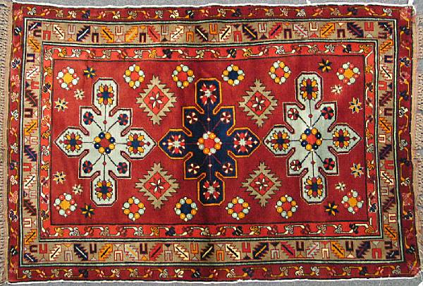 Appraisal: An Afghan rug size approximately ft in x ft in