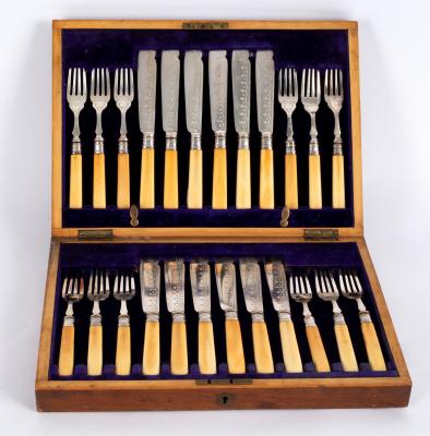 Appraisal: A set of twelve silver plated fish knives and forks