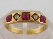 Appraisal: A ruby and diamond five stone ring alternately set with