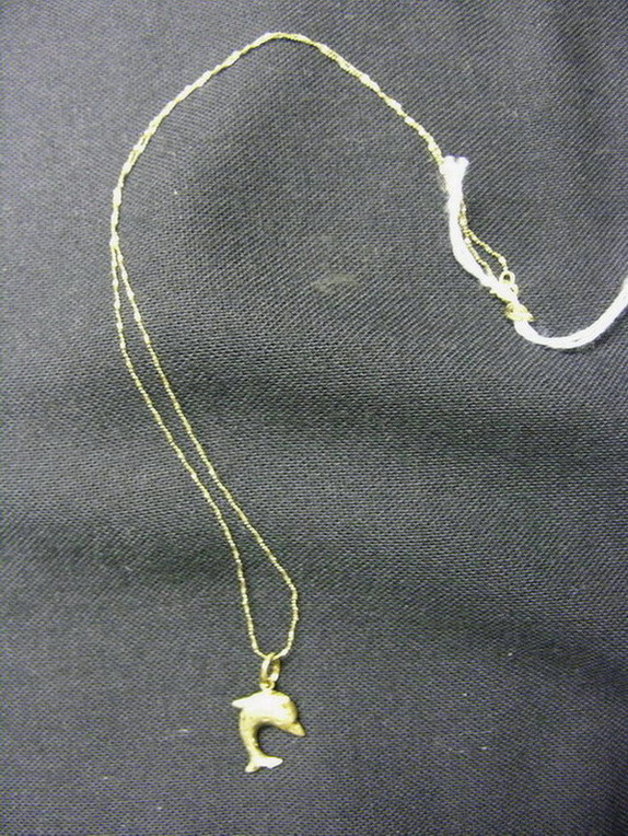 Appraisal: K ITALY GOLD NECKLACE WITH DOLPHIN Size chain Weight grams