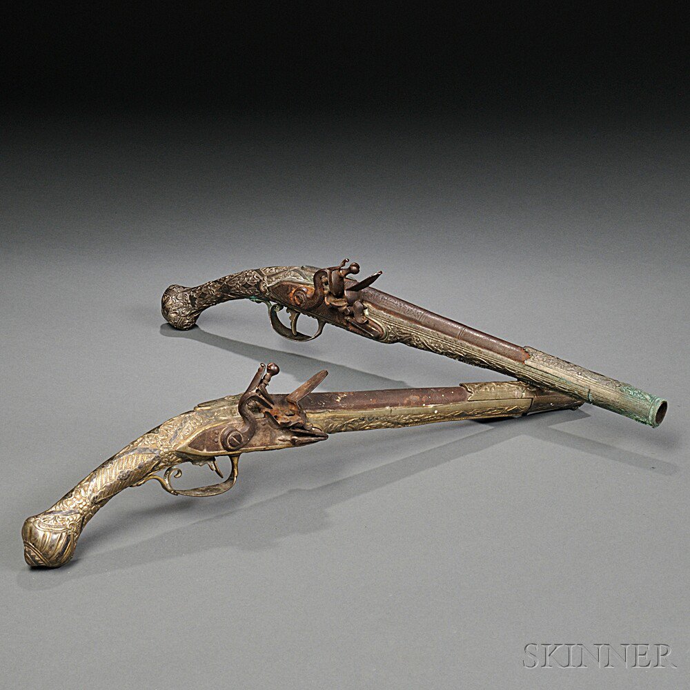 Appraisal: Two Middle Eastern Brass Flintlock Pistols c late th early