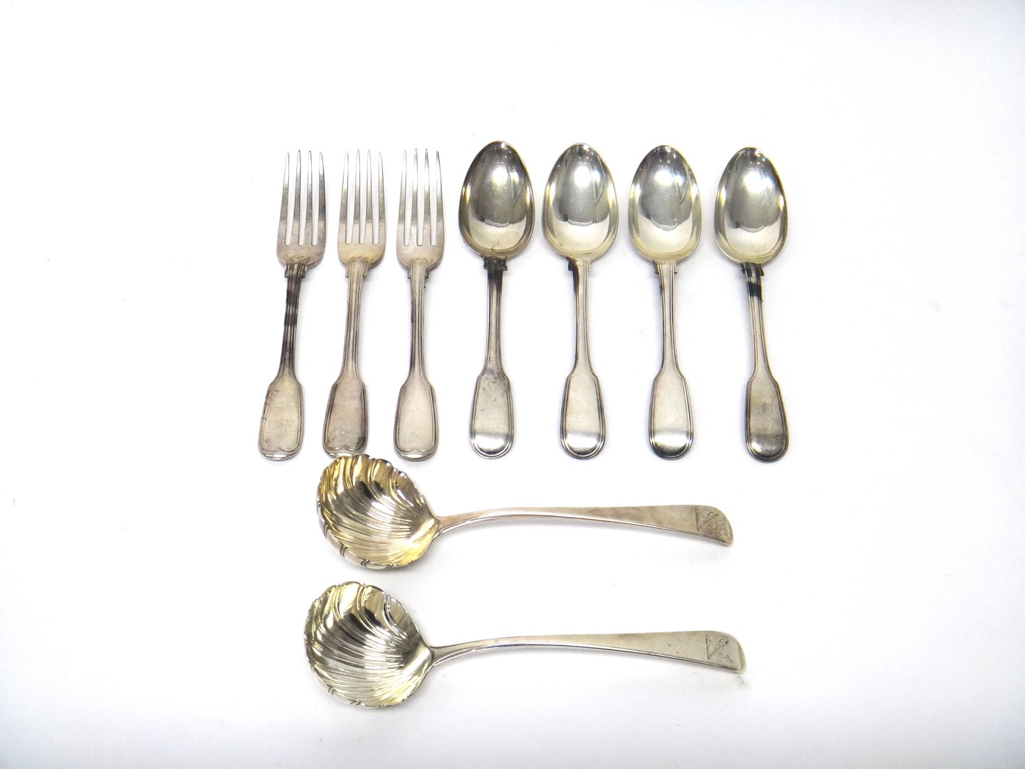 Appraisal: Silver flatware comprising three fiddle and thread pattern dessert forks