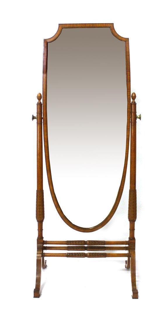 Appraisal: An early th century satinwood cheval mirror the bevelled shield