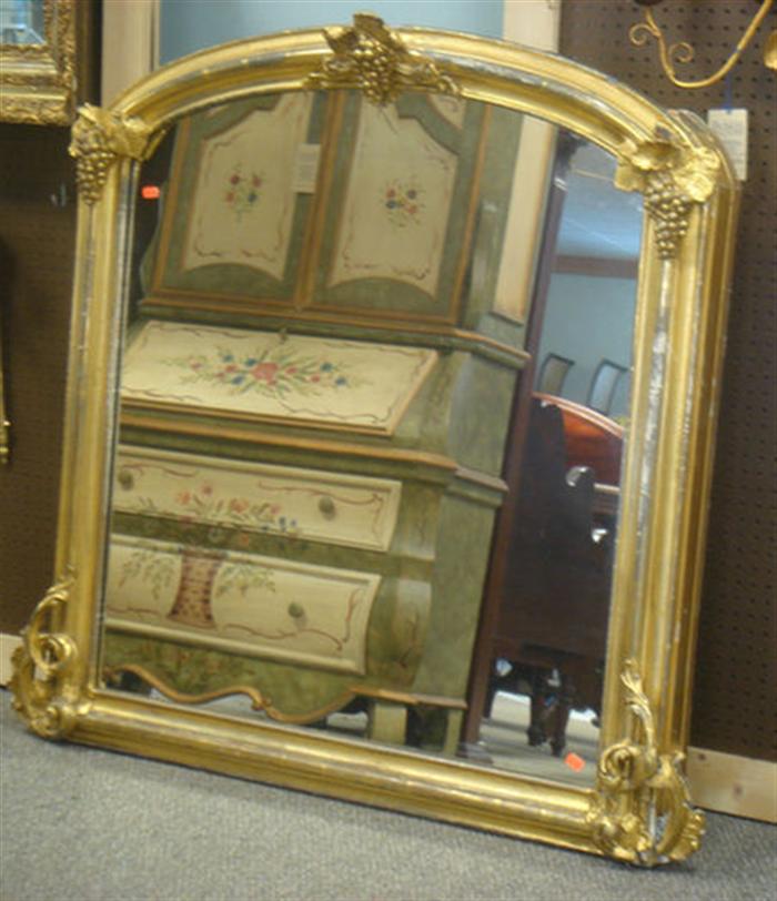 Appraisal: Gilt overmantle mirror with grape cluster crest h w some