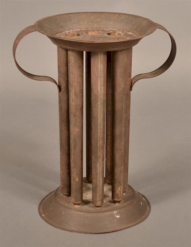 Appraisal: Tin Eight Tube Circular Form Candle Mold th Century Tin