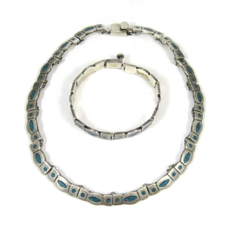 Appraisal: TAXCO MEXICAN STERLING SILVER NECKLACE AND BRACELET inset with turquoise