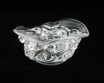 Appraisal: A Contemporary Baccarat Ashtray A contemporary Baccarat ashtray in organic