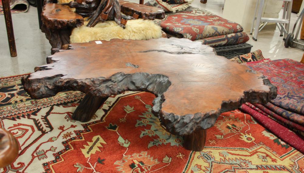 Appraisal: ARTISAN STUDIO REDWOOD COFFEE TABLE having a freeform redwood slab