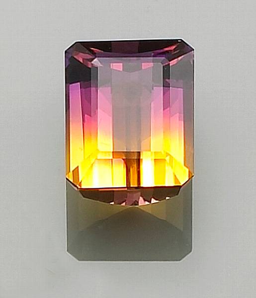 Appraisal: Ametrine Bolivia A rectangular-cut ring-sized stone with nearly equal zones