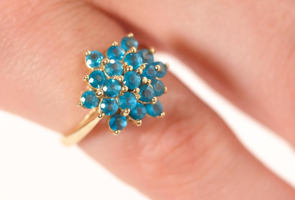 Appraisal: k yellow gold ring floral shaped ring set with round