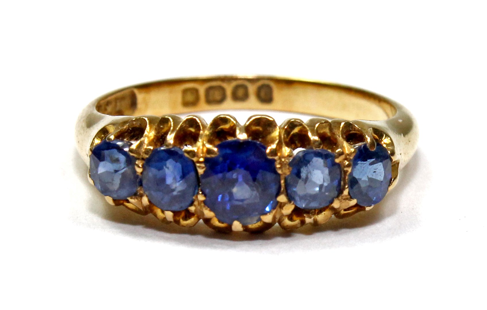 Appraisal: An ct gold and sapphire set five stone ring mounted