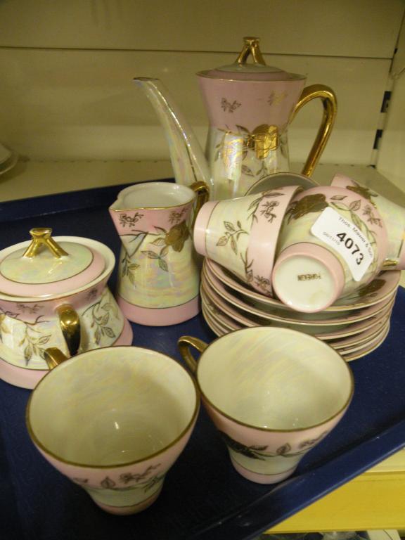 Appraisal: A Japanese porcelain tea service in pink and white lustre