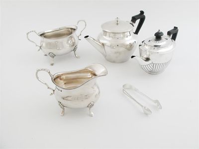 Appraisal: An ogee oval sugar basin and milk jug with bead