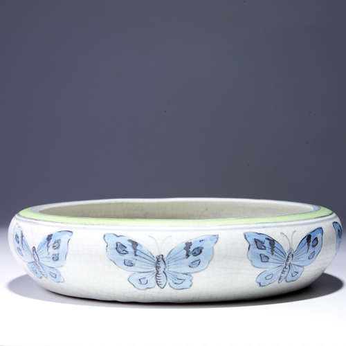 Appraisal: Rare and early MCCOY low bowl painted with blue butterflies