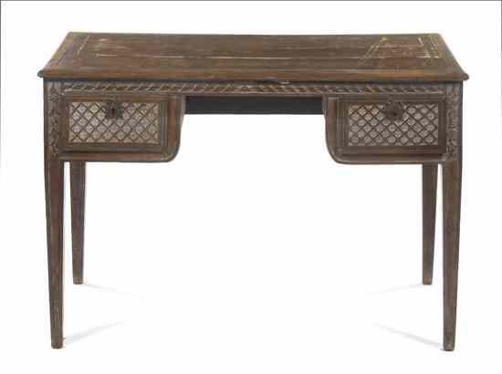 Appraisal: A Venetian Carved Writing Desk having a rectangular leather inset