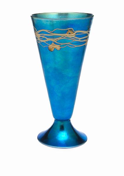 Appraisal: A Steuben decorated blue Aurene glass footed vase shape circa