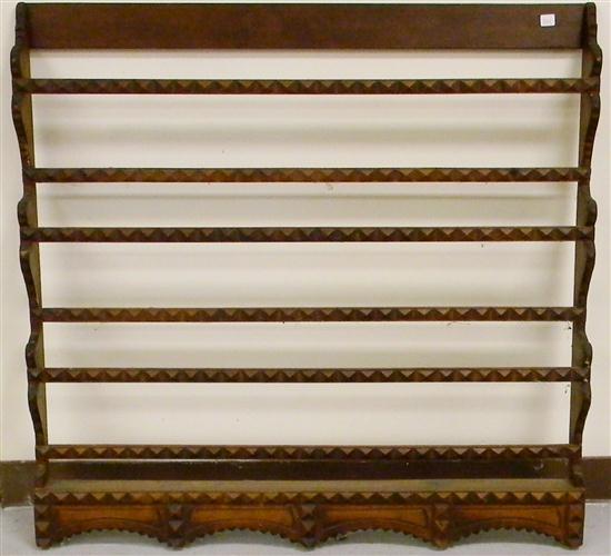 Appraisal: Pine wall mounted plate rack three tier diamond decoration on