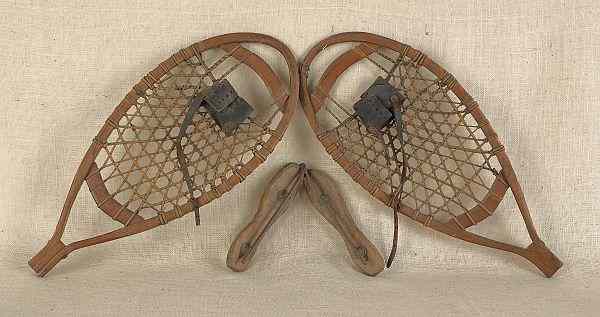 Appraisal: Pair of snow shoes th c together with two pair