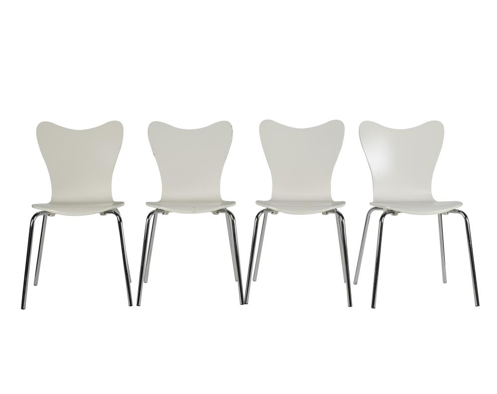 Appraisal: FOUR CONTEMPORARY WHITE MOLDED PLYWOOD CHAIRSmanufactured by West Elm inches