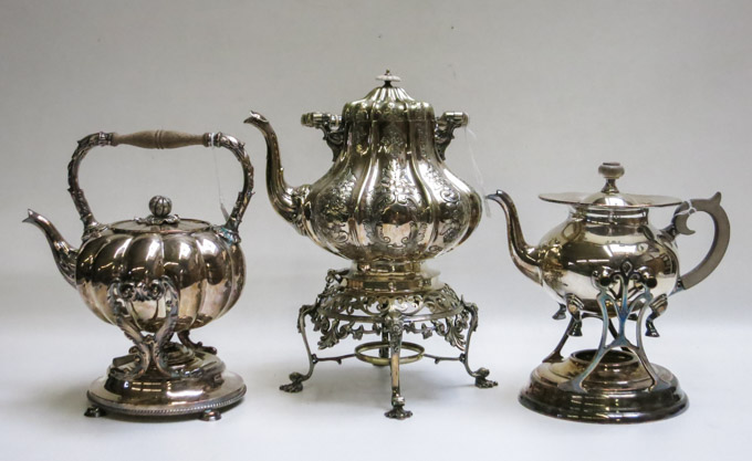 Appraisal: THREE SILVER PLATED WATER KETTLES ON STANDS the largest by